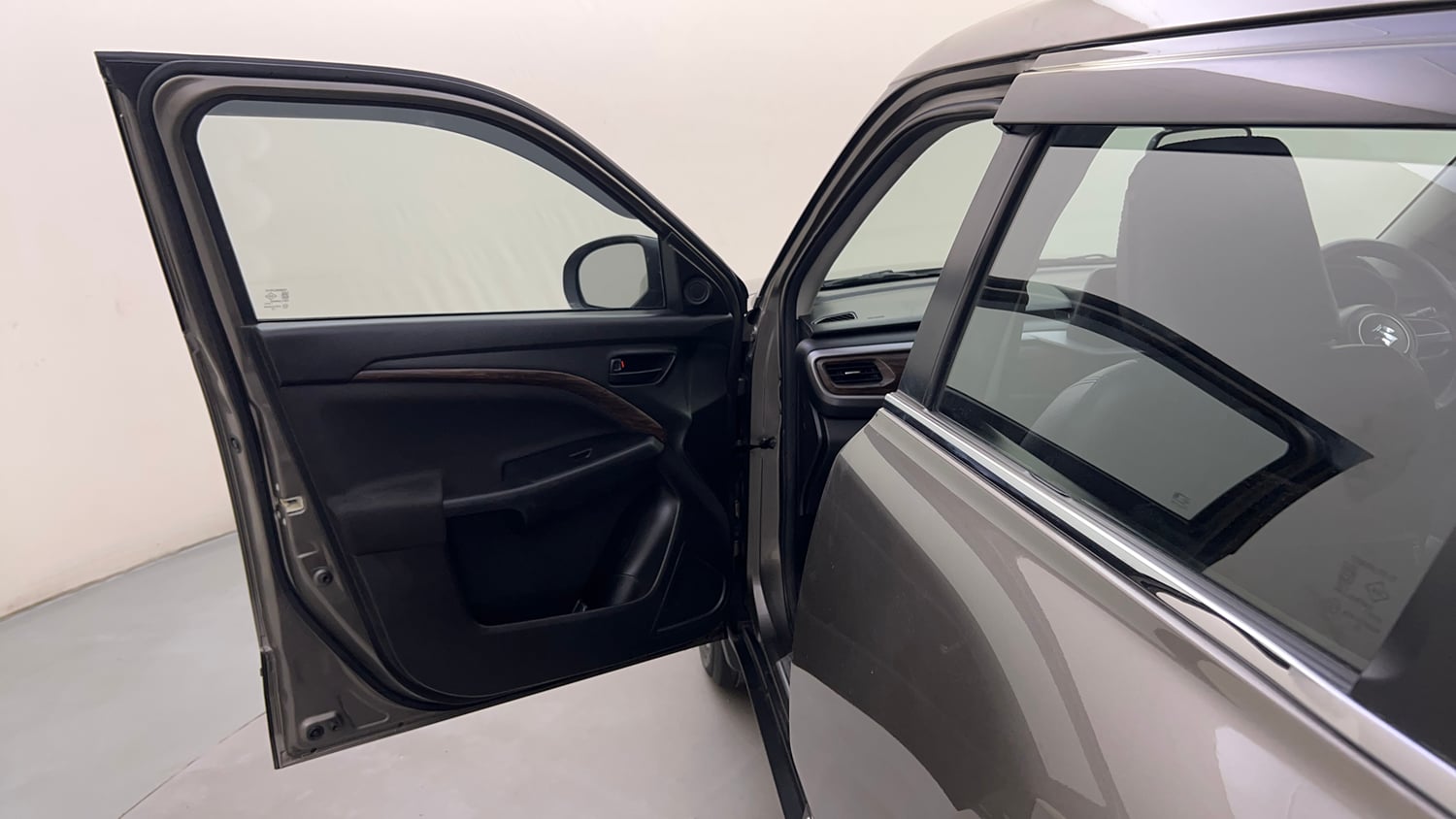 Used 2023 Maruti Suzuki Brezza Vxi AT Petrol Automatic interior LEFT FRONT DOOR OPEN VIEW