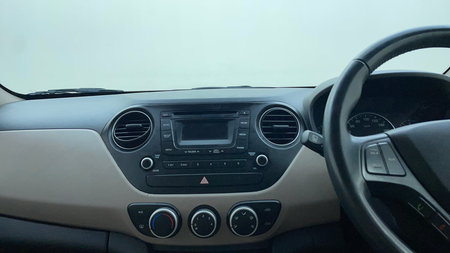 Used 2014 Hyundai Grand i10 Asta AT 1.2 Kappa VTVT Petrol Automatic interior MUSIC SYSTEM & AC CONTROL VIEW