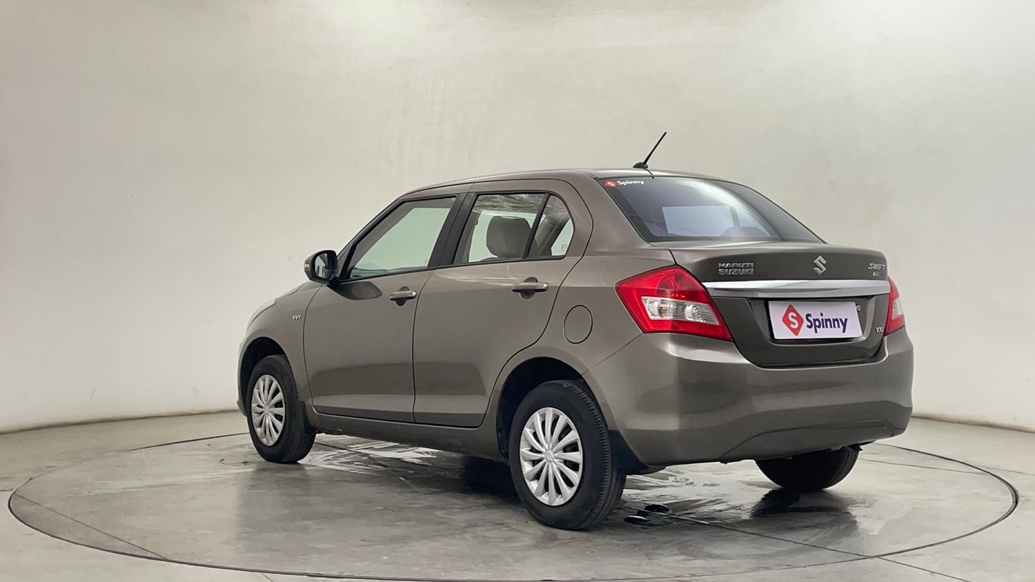 Used 2016 Maruti Suzuki Swift Dzire VXI Petrol Manual exterior LEFT REAR CORNER VIEW