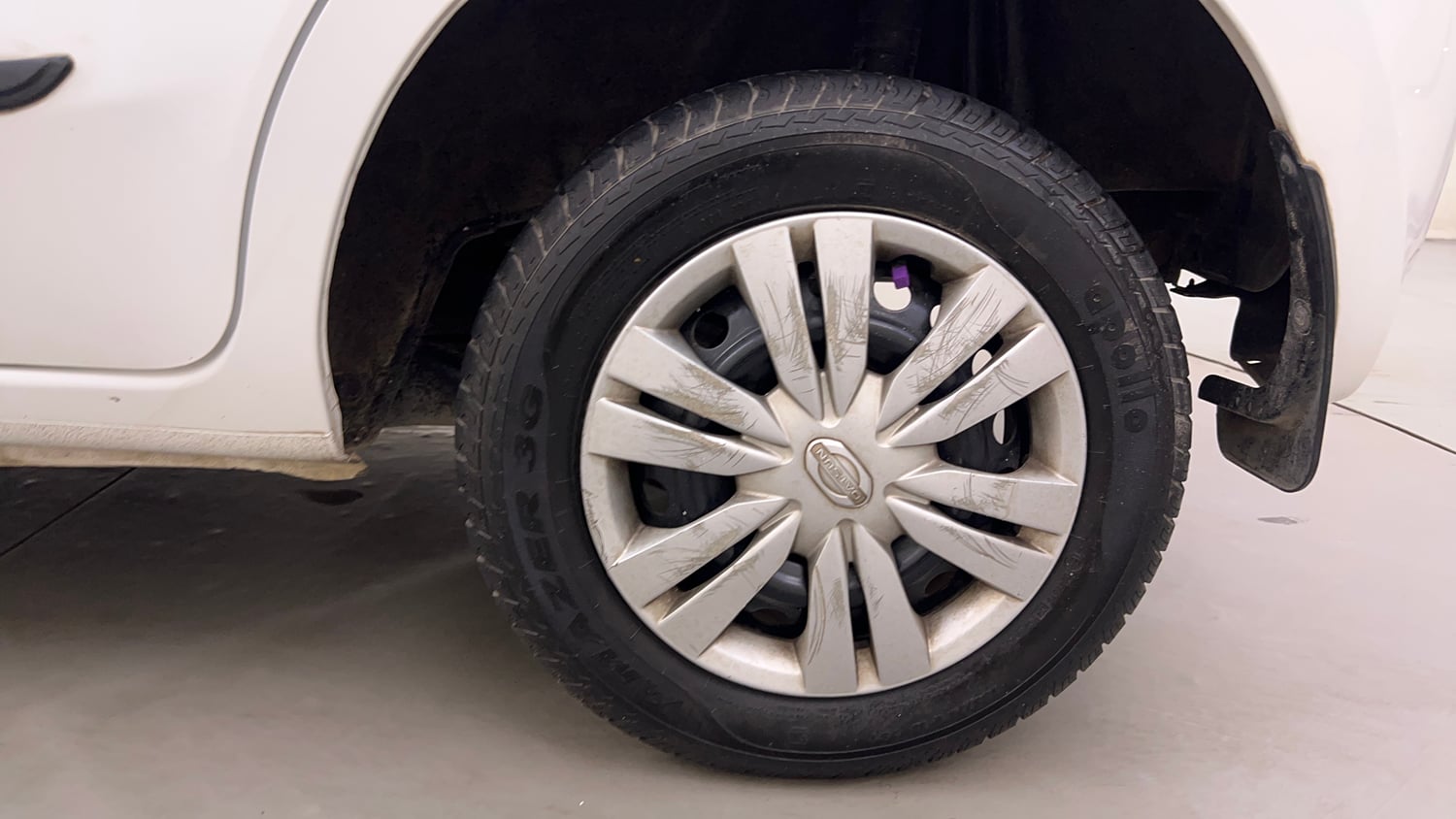 Used 2015 Datsun GO T Petrol Manual tyres LEFT REAR TYRE RIM VIEW