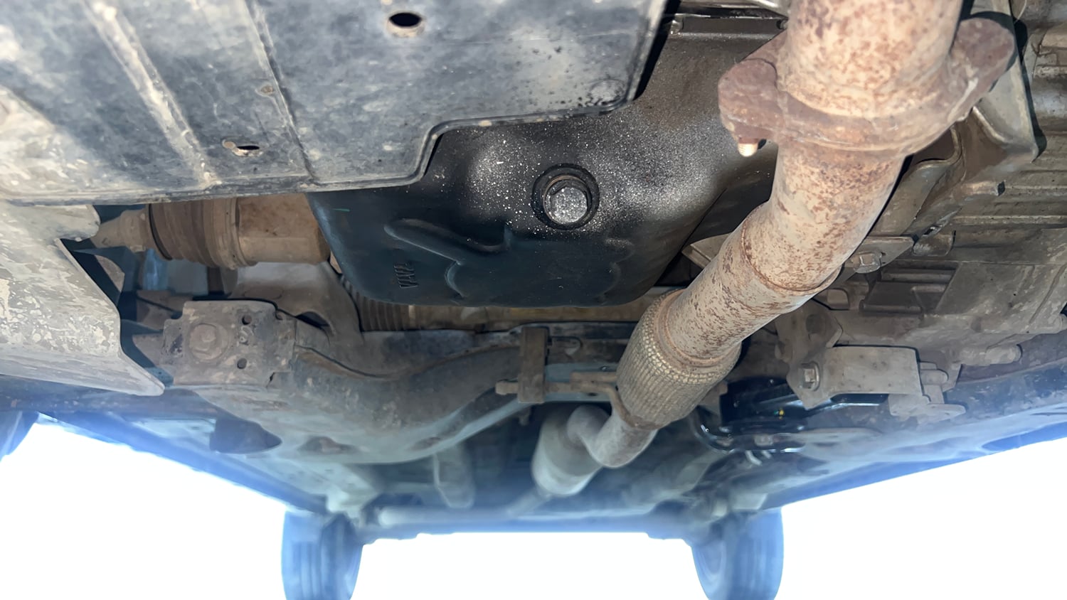 Used 2023 Tata Nexon XZA Plus LUXS Red Dark Edition Petrol Automatic extra FRONT LEFT UNDERBODY VIEW