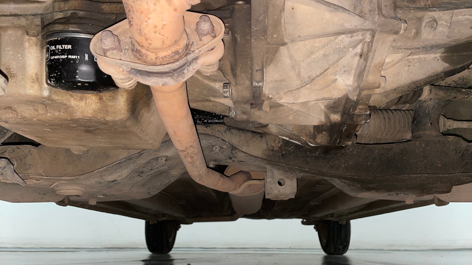 Used 2016 Maruti Suzuki Celerio ZXI (O) AMT Petrol Automatic extra FRONT LEFT UNDERBODY VIEW