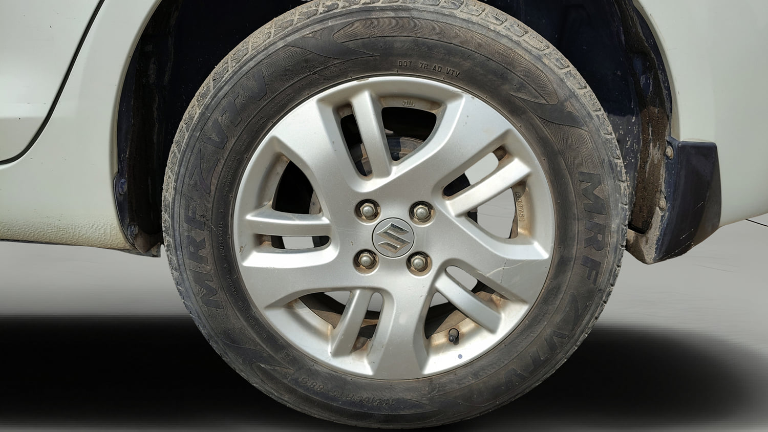 Used 2012 Maruti Suzuki Swift Dzire ZXI Petrol Manual tyres LEFT REAR TYRE RIM VIEW