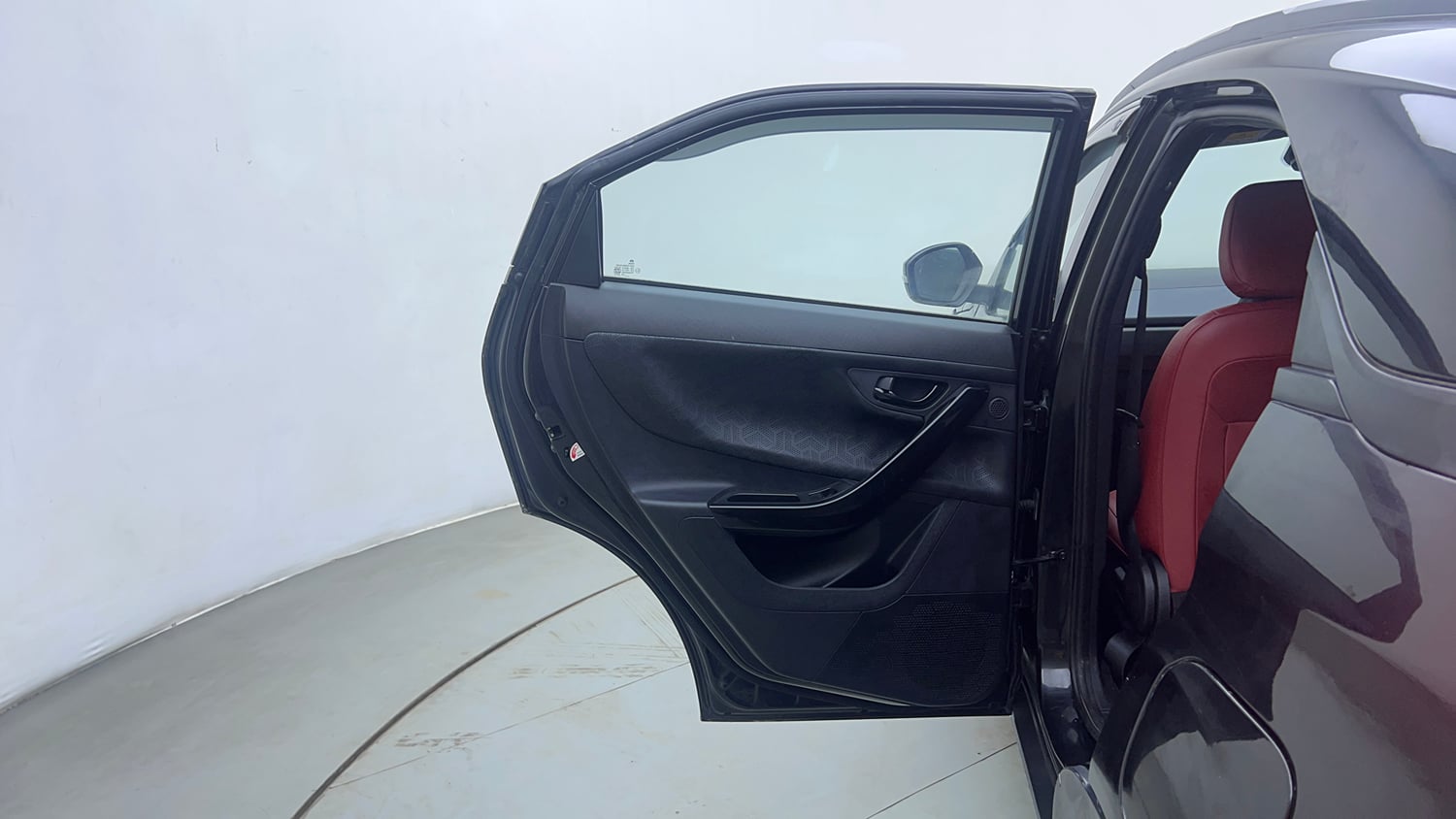 Used 2023 Tata Nexon XZA Plus LUXS Red Dark Edition Petrol Automatic interior LEFT REAR DOOR OPEN VIEW