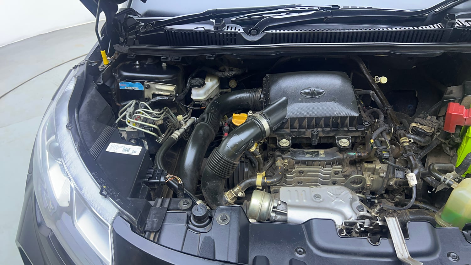 Used 2023 Tata Nexon XZA Plus LUXS Red Dark Edition Petrol Automatic engine ENGINE RIGHT SIDE VIEW