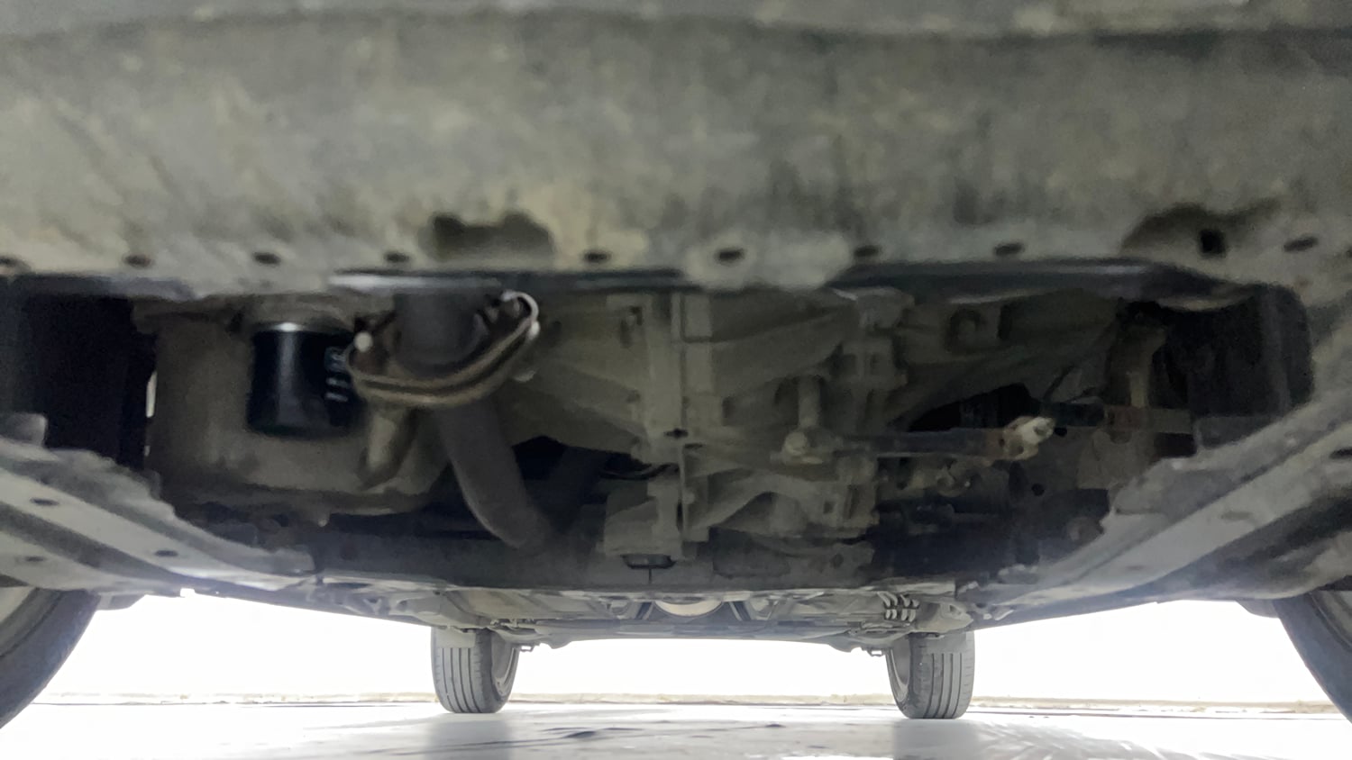 Used 2021 Maruti Suzuki Baleno Zeta Petrol Manual extra FRONT LEFT UNDERBODY VIEW