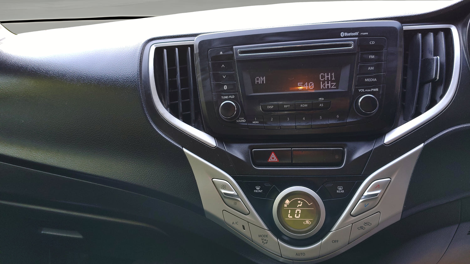 Used 2017 Maruti Suzuki Baleno Zeta 1.2 Petrol Manual interior MUSIC SYSTEM & AC CONTROL VIEW
