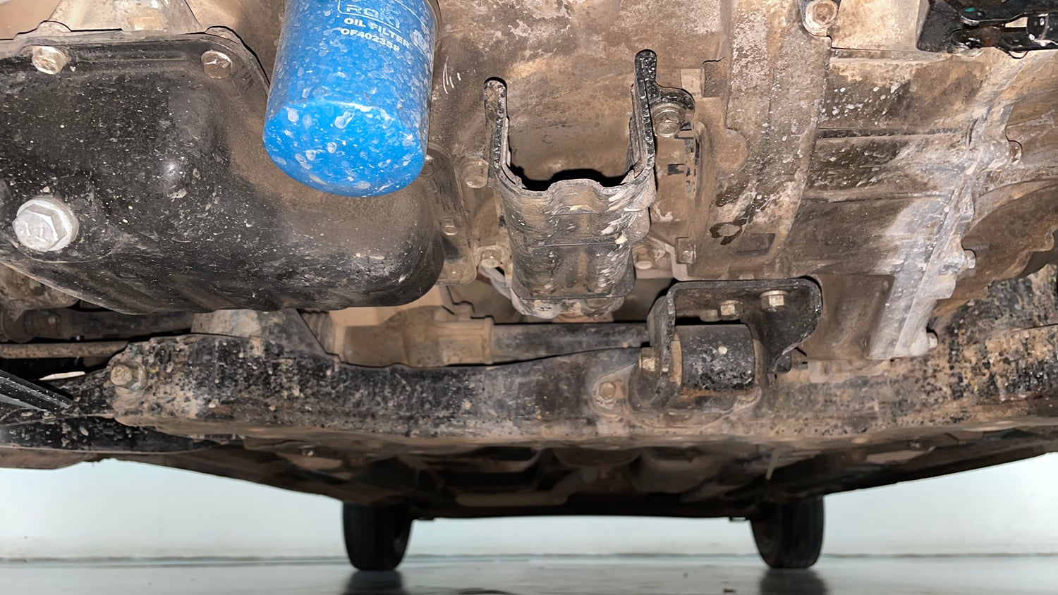 Used 2014 Hyundai Grand i10 Sportz 1.2 Kappa VTVT Petrol Manual extra FRONT LEFT UNDERBODY VIEW