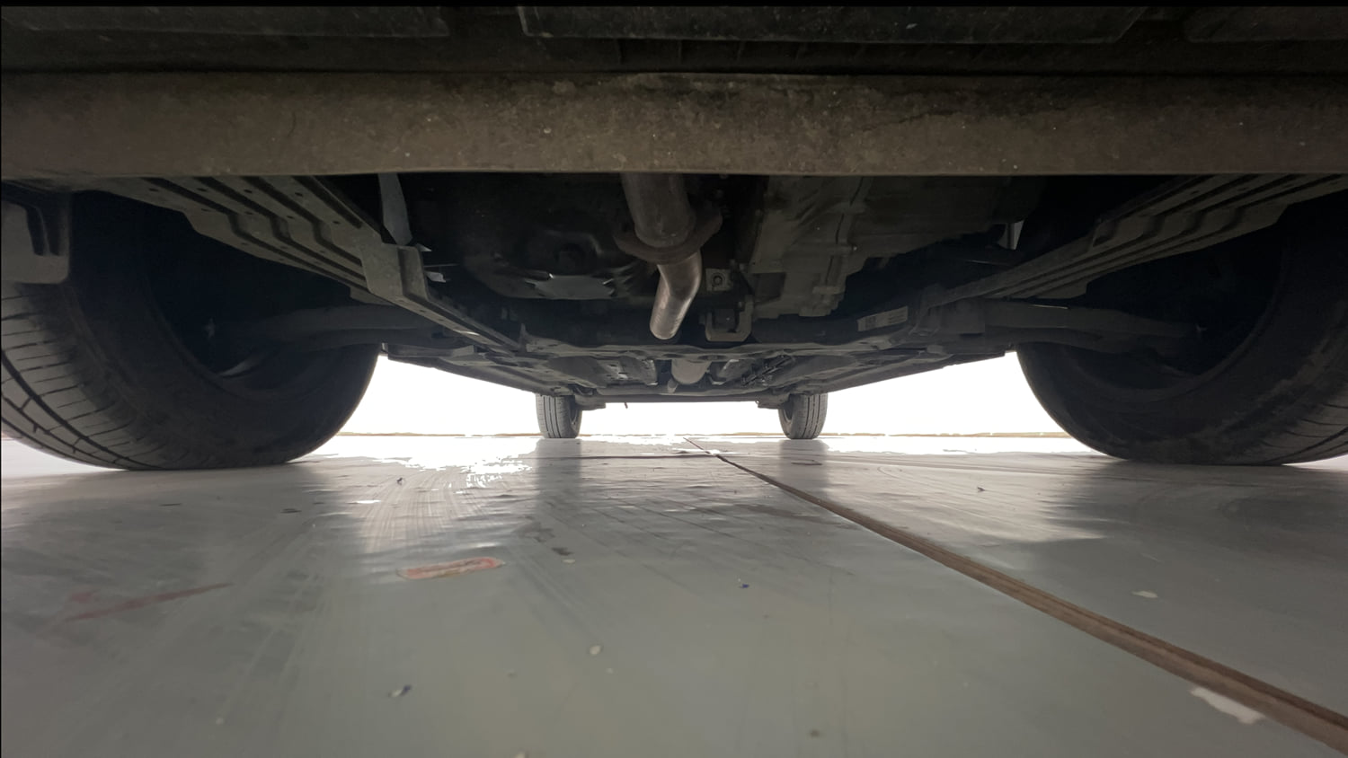 Used 2023 Tata Punch Camo Adventure Rhythm MT Petrol Manual extra FRONT LEFT UNDERBODY VIEW