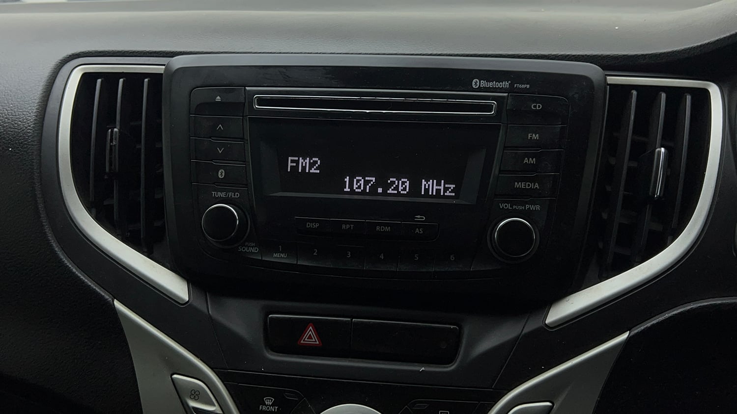 Used 2018 Maruti Suzuki Baleno Zeta 1.2 Petrol Manual top_features Integrated (in-dash) music system