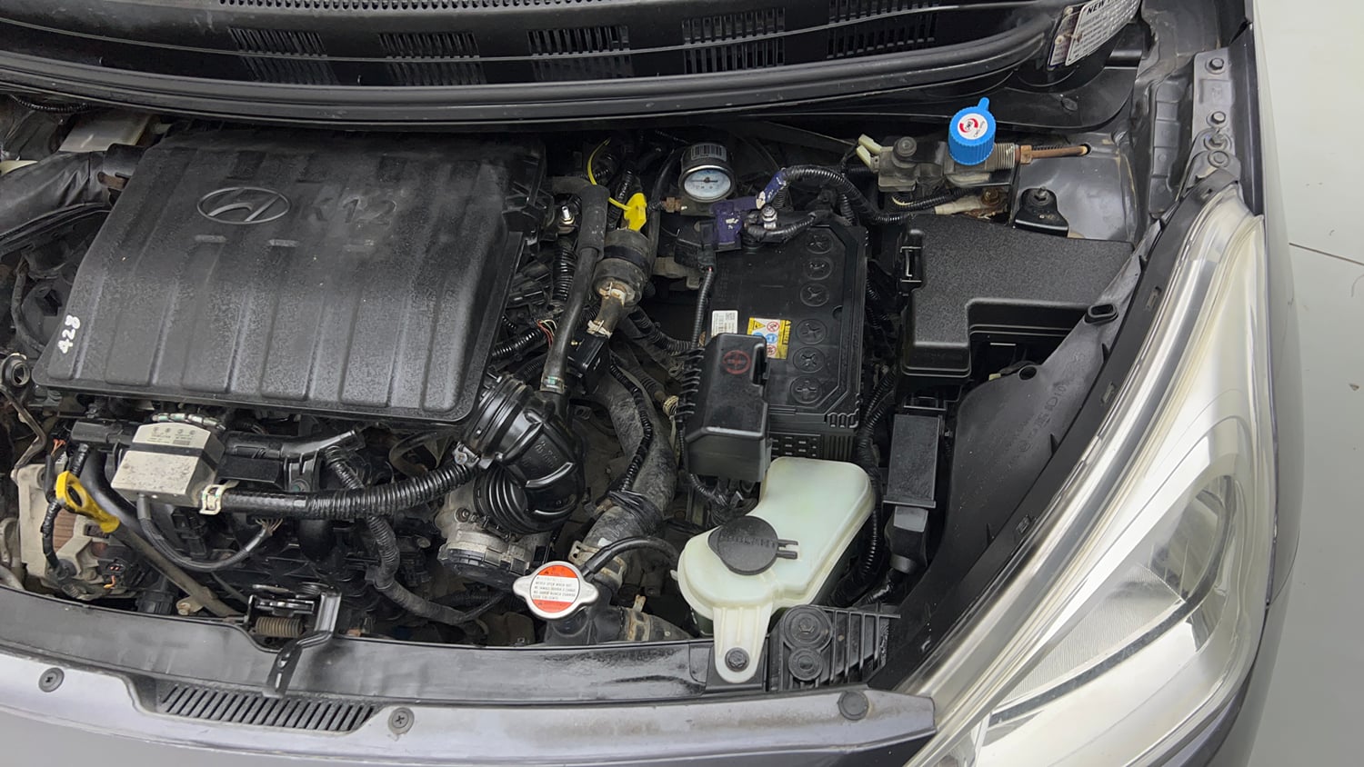 Used 2017 Hyundai Grand i10 Sportz (O) 1.2 kappa VTVT CNG (Outside Fitted) Cng Manual engine ENGINE LEFT SIDE VIEW