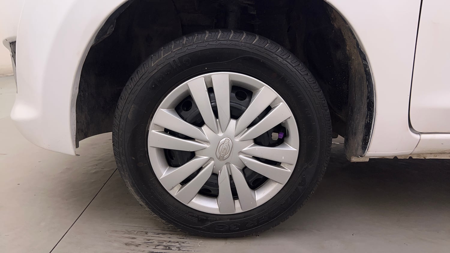 Used 2015 Datsun GO T Petrol Manual tyres LEFT FRONT TYRE RIM VIEW