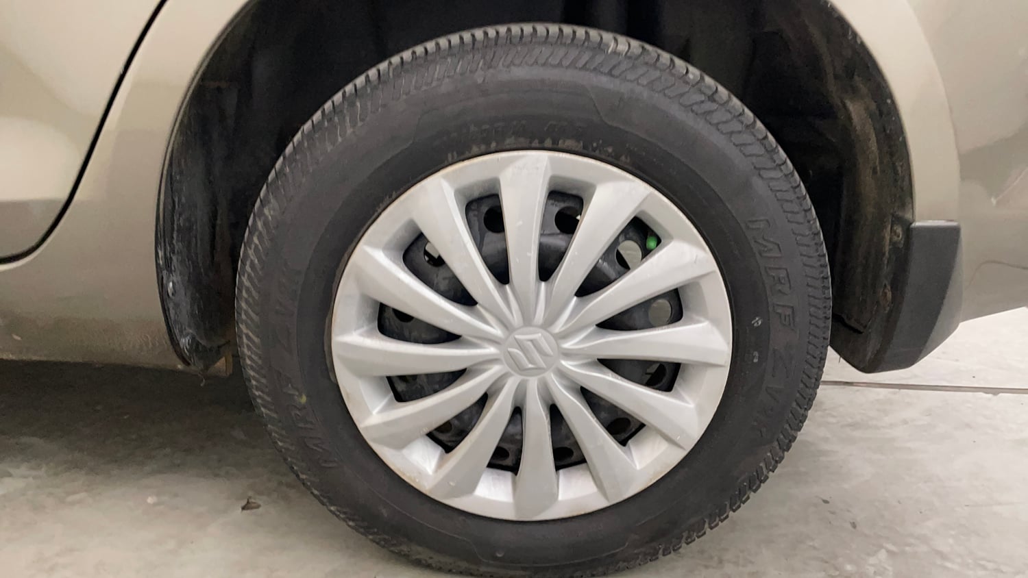 Used 2016 Maruti Suzuki Swift Dzire VXI Petrol Manual tyres LEFT REAR TYRE RIM VIEW