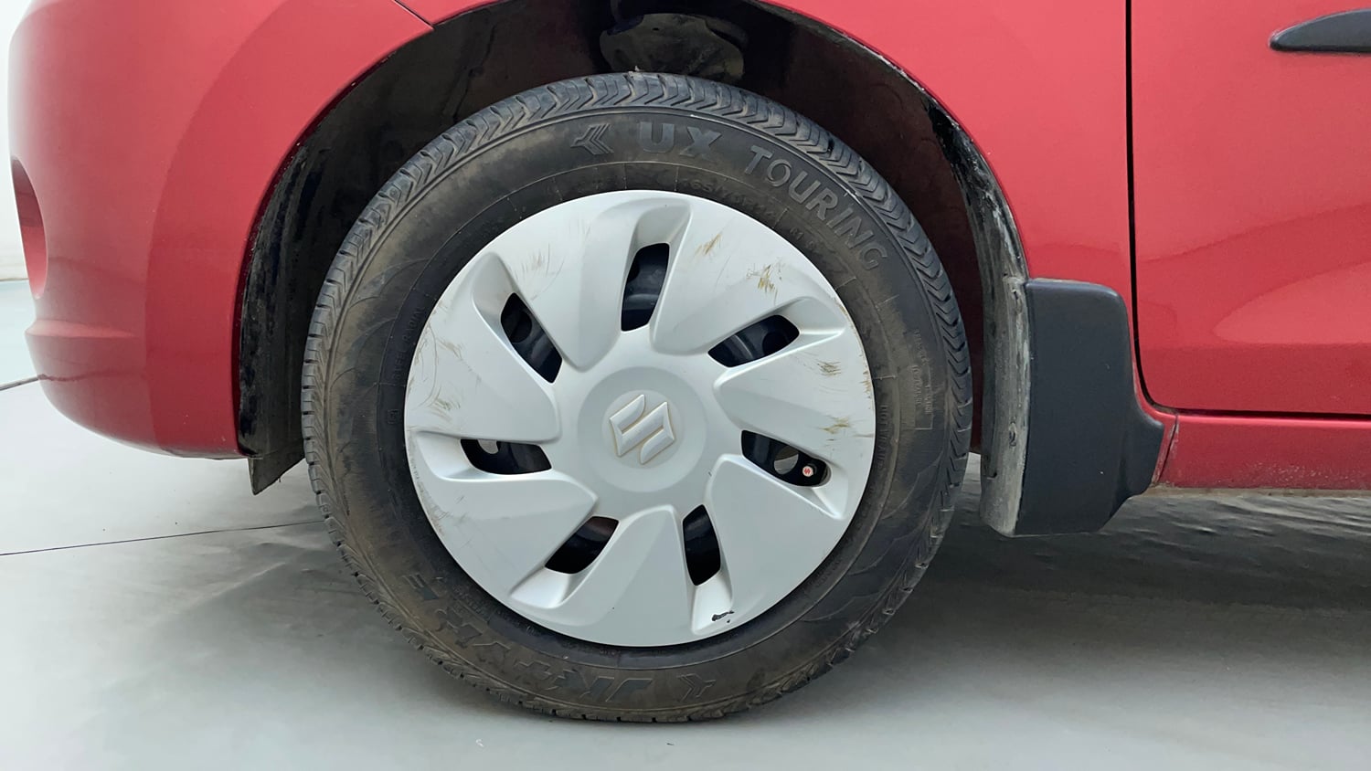 Used 2016 Maruti Suzuki Celerio VXI (O) AMT Petrol Automatic tyres LEFT FRONT TYRE RIM VIEW