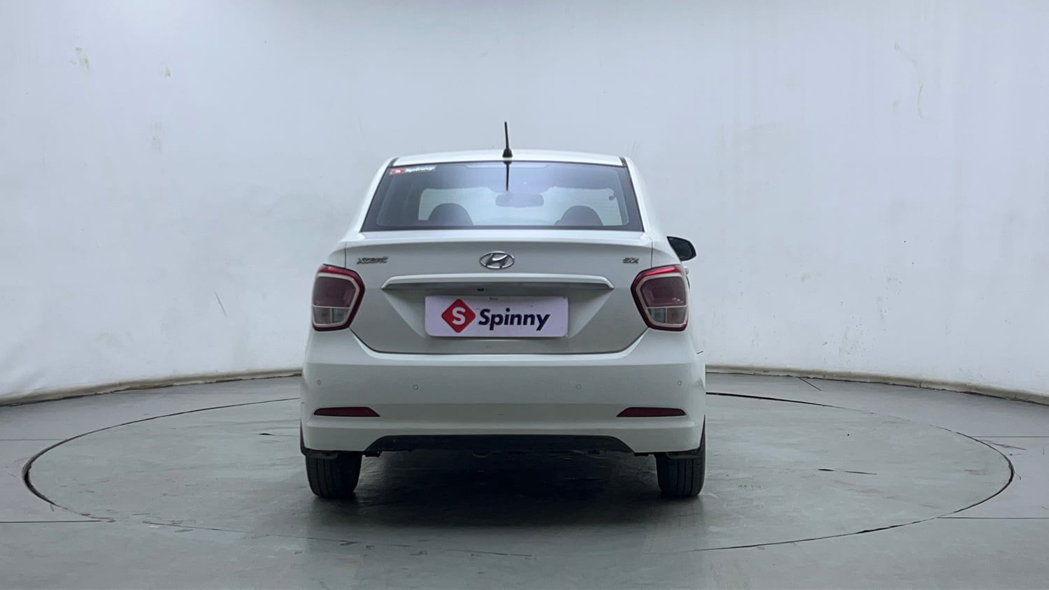 Used 2015 Hyundai Xcent SX 1.2 Petrol Manual exterior BACK VIEW