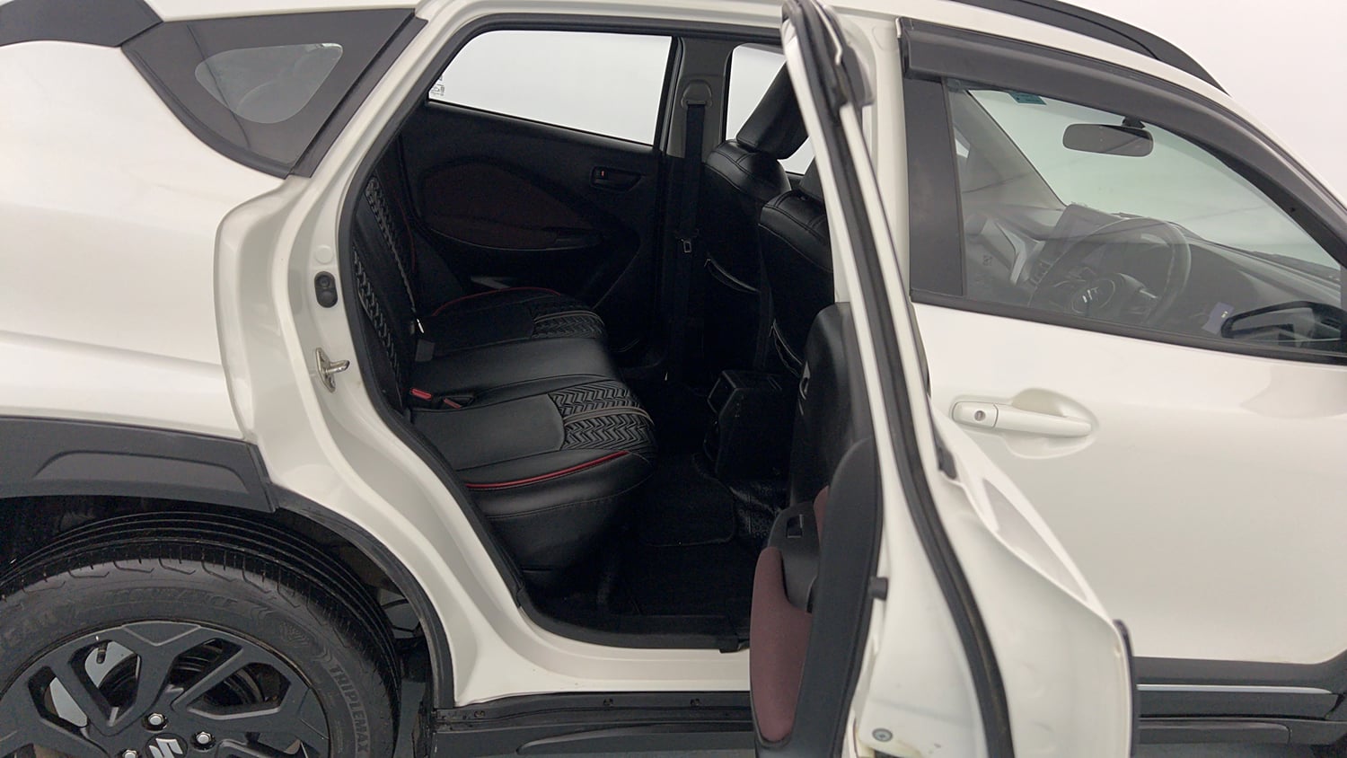 Used 2024 Maruti Suzuki Fronx Delta Plus 1.2L MT Petrol Manual interior RIGHT SIDE REAR DOOR CABIN VIEW