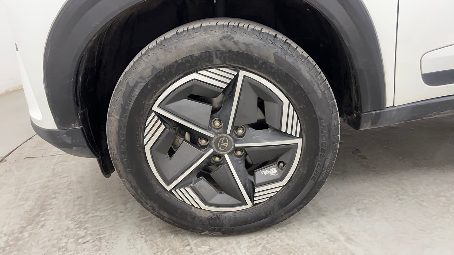 Used 2024 Tata Nexon Creative Plus S 1.2 Revotron Petrol 6AMT Petrol Automatic tyres LEFT FRONT TYRE RIM VIEW