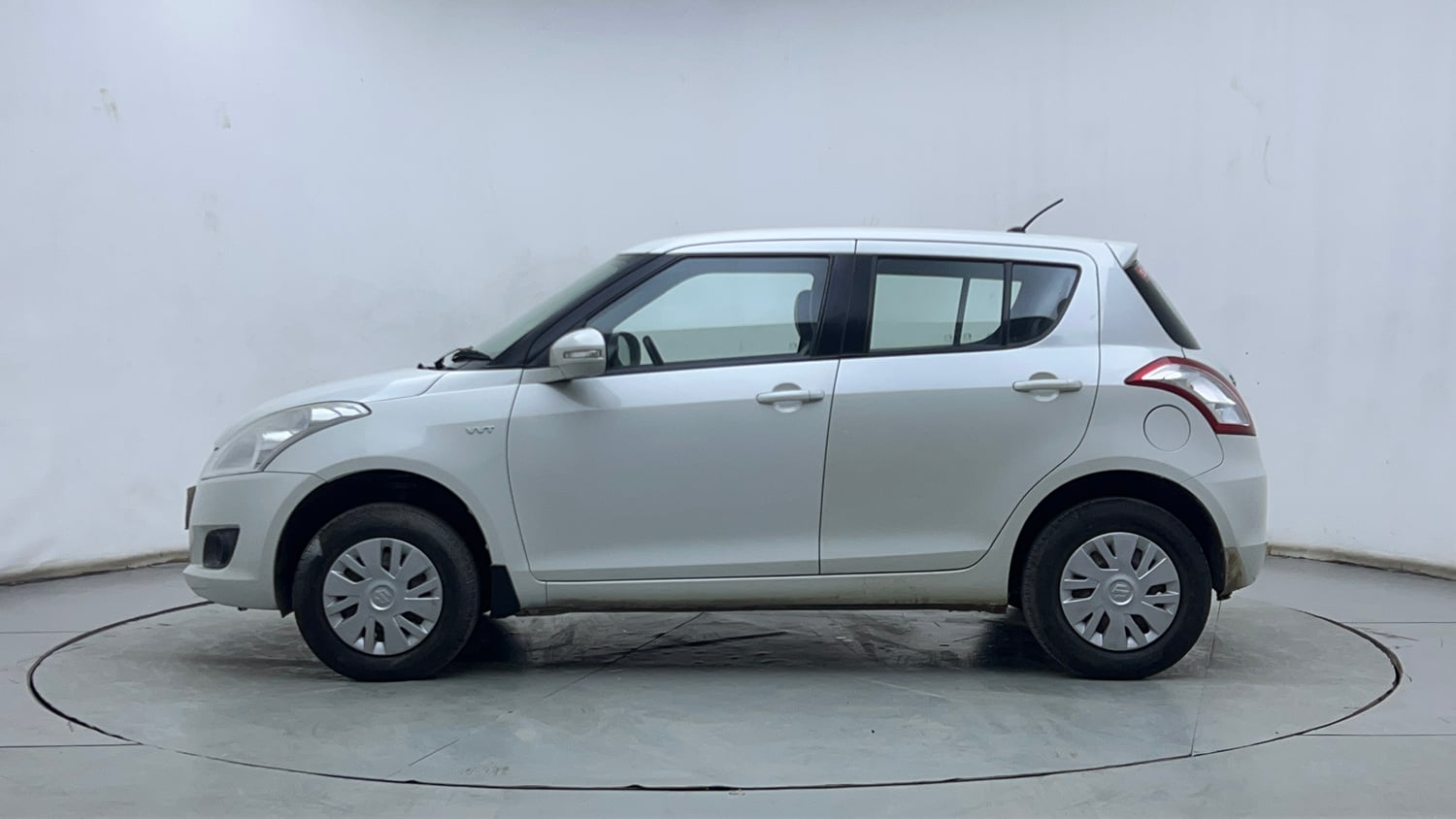 Used 2013 Maruti Suzuki Swift VXi Petrol Manual exterior LEFT SIDE VIEW