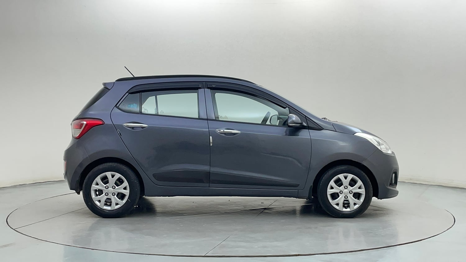 Used 2014 Hyundai Grand i10 Sportz 1.2 Kappa VTVT Petrol Manual exterior RIGHT SIDE VIEW