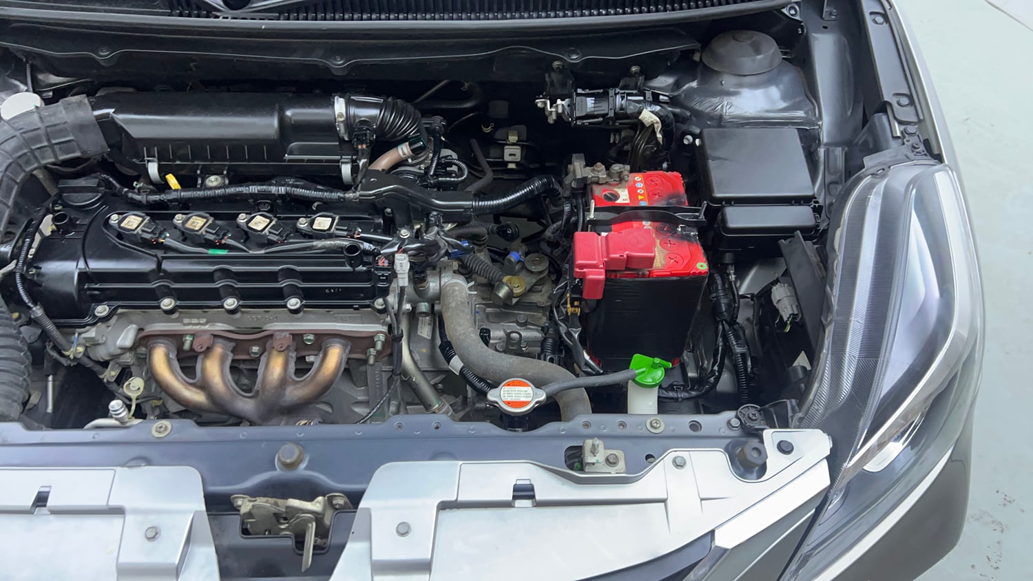 Used 2021 Maruti Suzuki Baleno Zeta Petrol Manual engine ENGINE LEFT SIDE VIEW