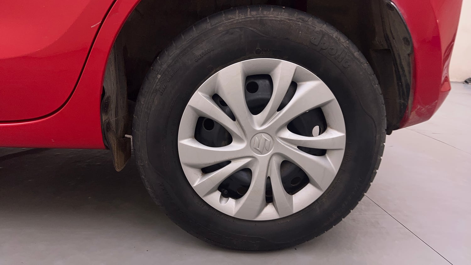 Used 2023 Maruti Suzuki Swift VXi AMT Petrol Automatic tyres LEFT REAR TYRE RIM VIEW