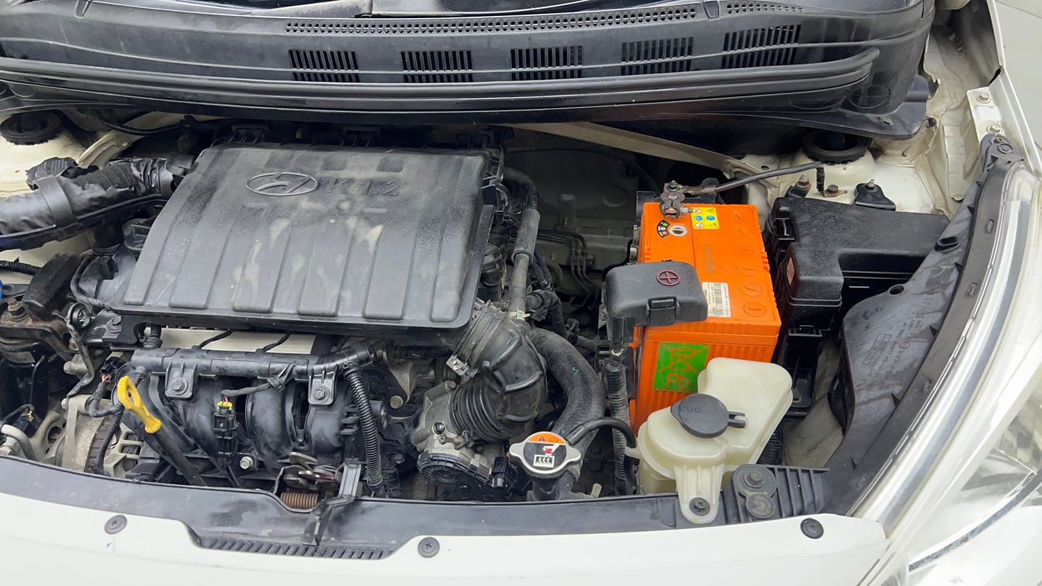 Used 2016 Hyundai Grand i10 Anniversary Edition Petrol Manual engine ENGINE LEFT SIDE VIEW
