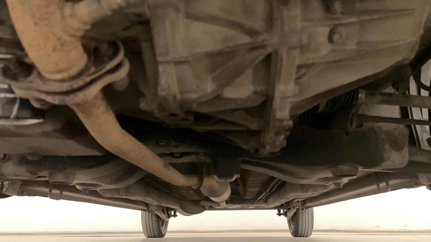 Used 2018 Maruti Suzuki Wagon R 1.0 VXI AMT Petrol Automatic extra FRONT LEFT UNDERBODY VIEW