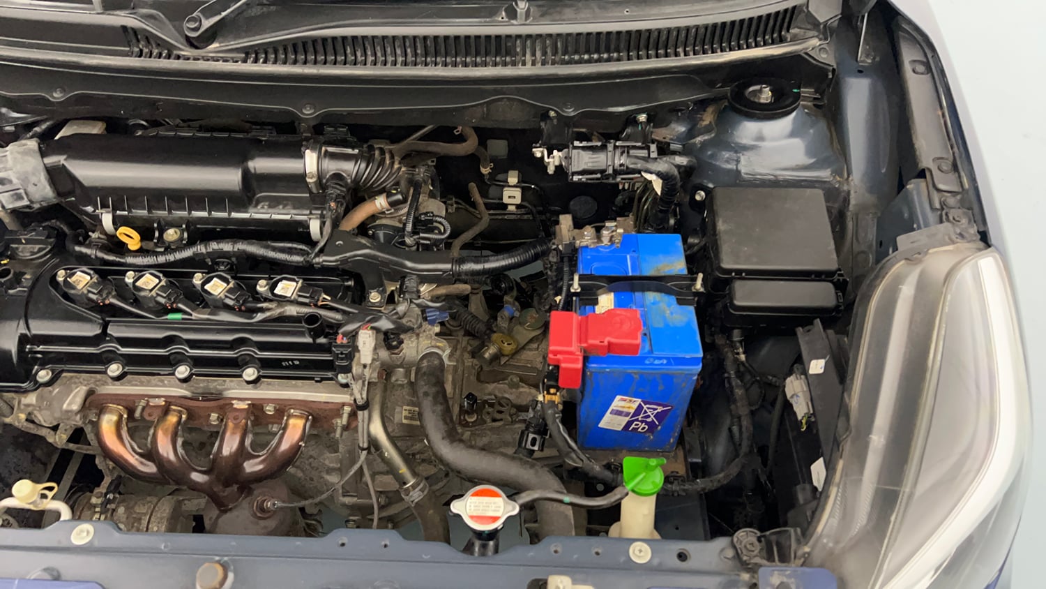 Used 2019 Maruti Suzuki Baleno Delta Petrol Manual engine ENGINE LEFT SIDE VIEW