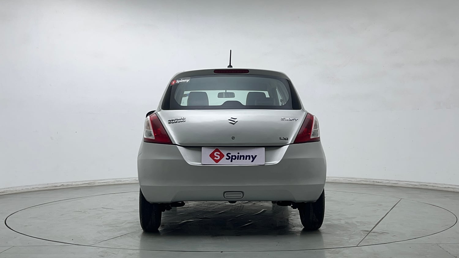 Used 2015 Maruti Suzuki Swift Lxi (O) Petrol Manual exterior BACK VIEW