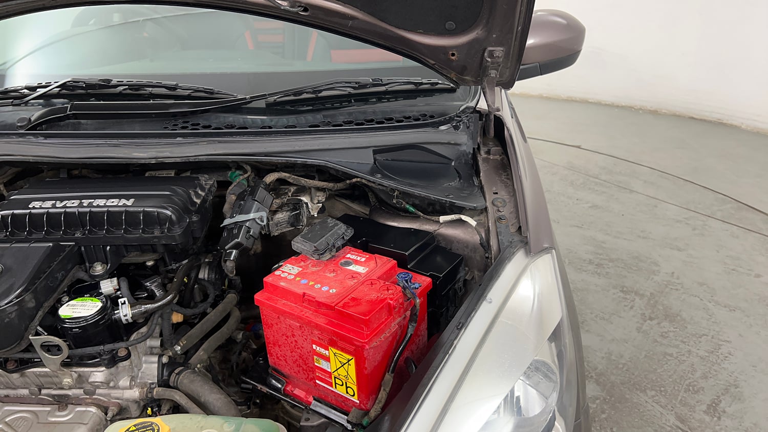 Used 2017 Tata Tiago Revotron XT Petrol Manual engine ENGINE LEFT SIDE HINGE & APRON VIEW