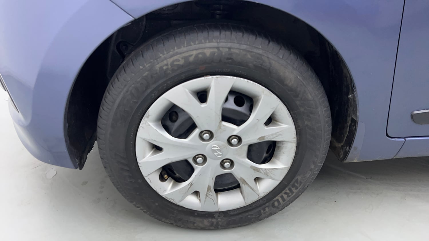 Used 2017 Hyundai Grand i10 Magna 1.2 Kappa VTVT Petrol Manual tyres LEFT FRONT TYRE RIM VIEW