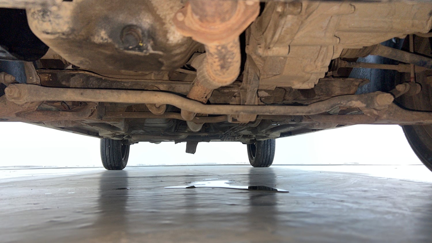 Used 2024 Tata Tigor XM Petrol Manual extra FRONT LEFT UNDERBODY VIEW