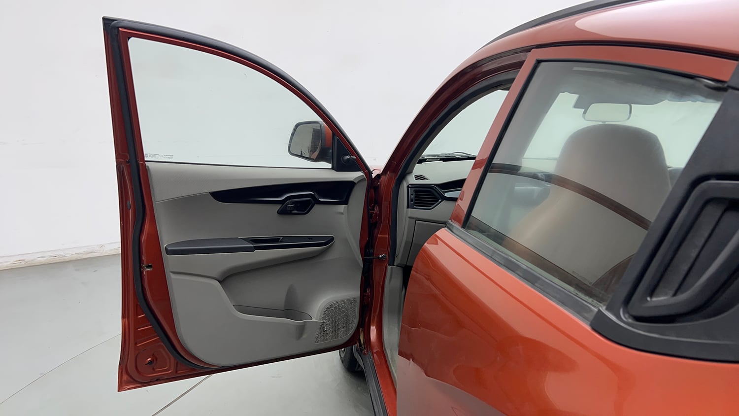 Used 2017 Mahindra KUV100 K4 6 STR Petrol Manual interior LEFT FRONT DOOR OPEN VIEW