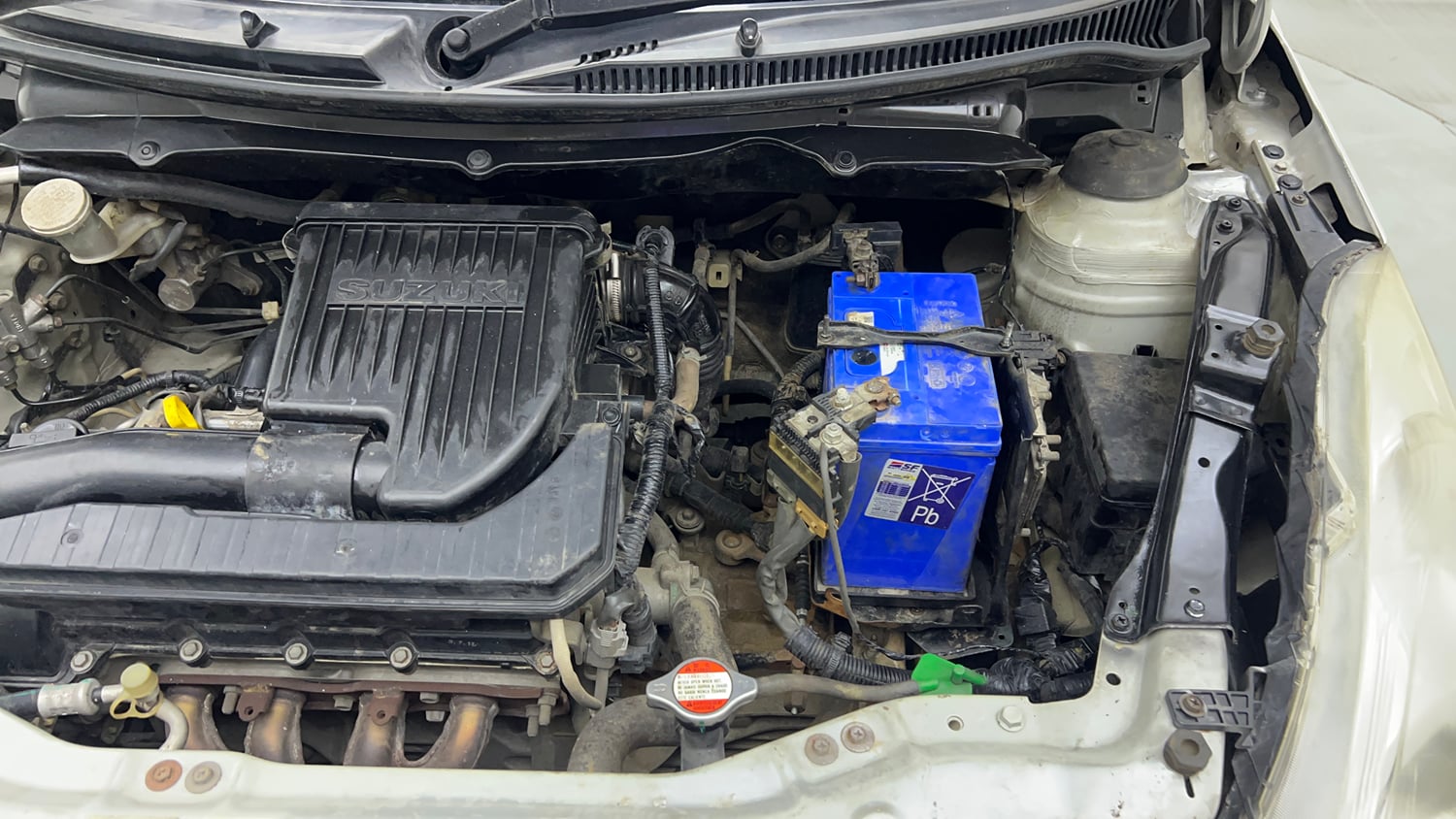 Used 2017 Maruti Suzuki Swift Lxi (O) Petrol Manual engine ENGINE LEFT SIDE VIEW