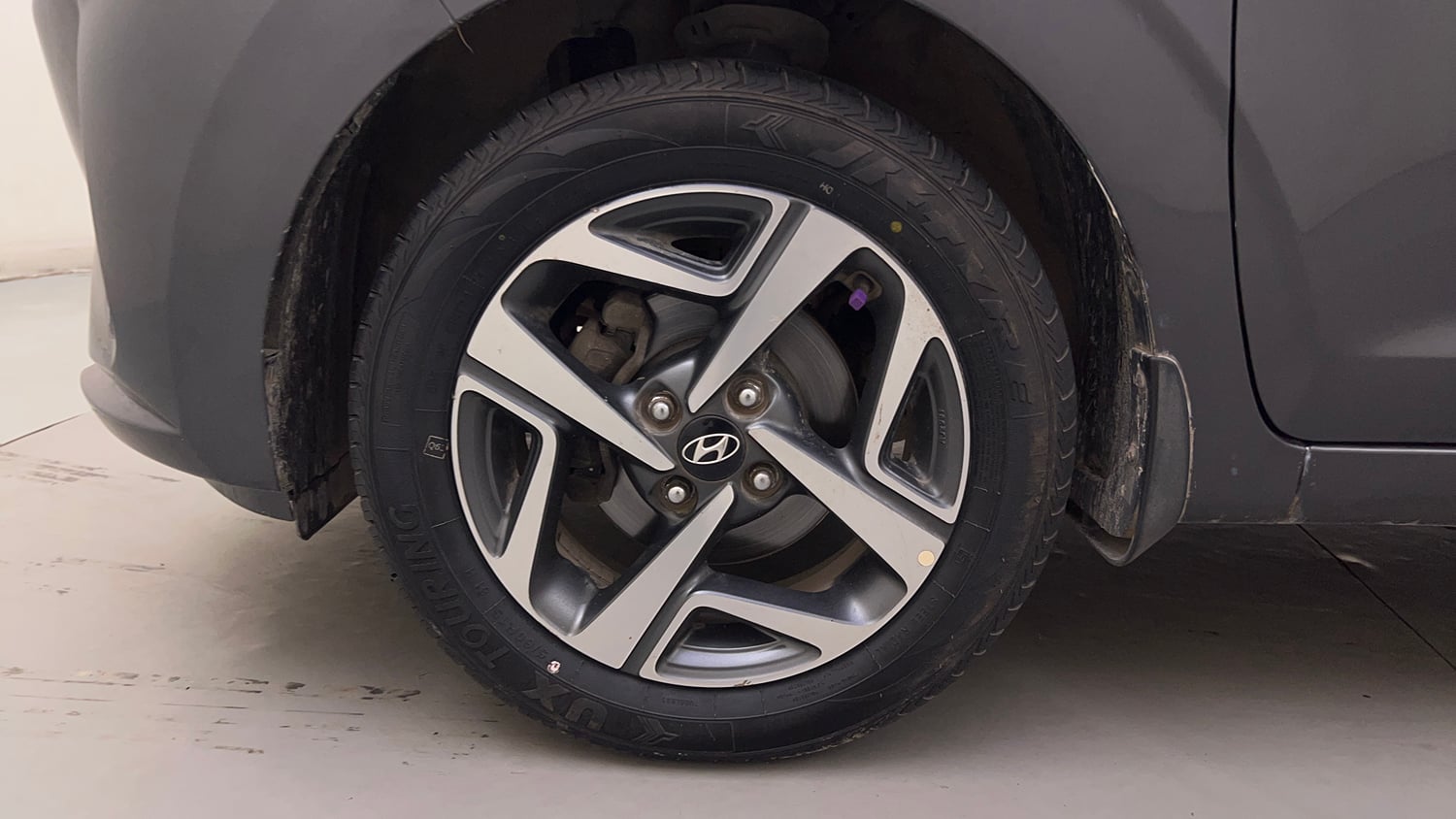 Used 2020 Hyundai Aura SX 1.2 (O) Petrol Petrol Manual tyres LEFT FRONT TYRE RIM VIEW