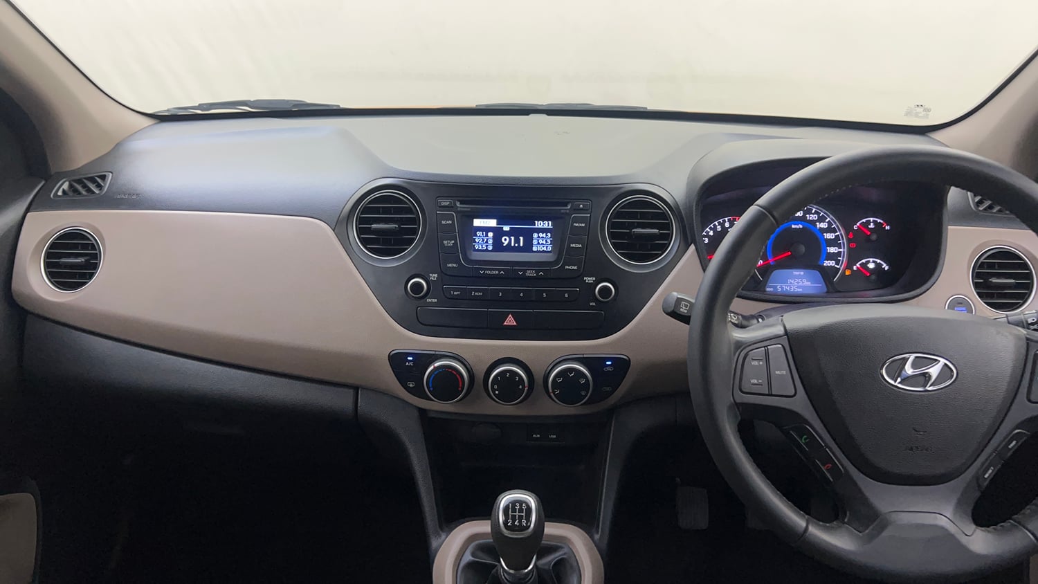 Used 2013 Hyundai Grand i10 Asta 1.2 Kappa VTVT Petrol Manual interior MUSIC SYSTEM & AC CONTROL VIEW