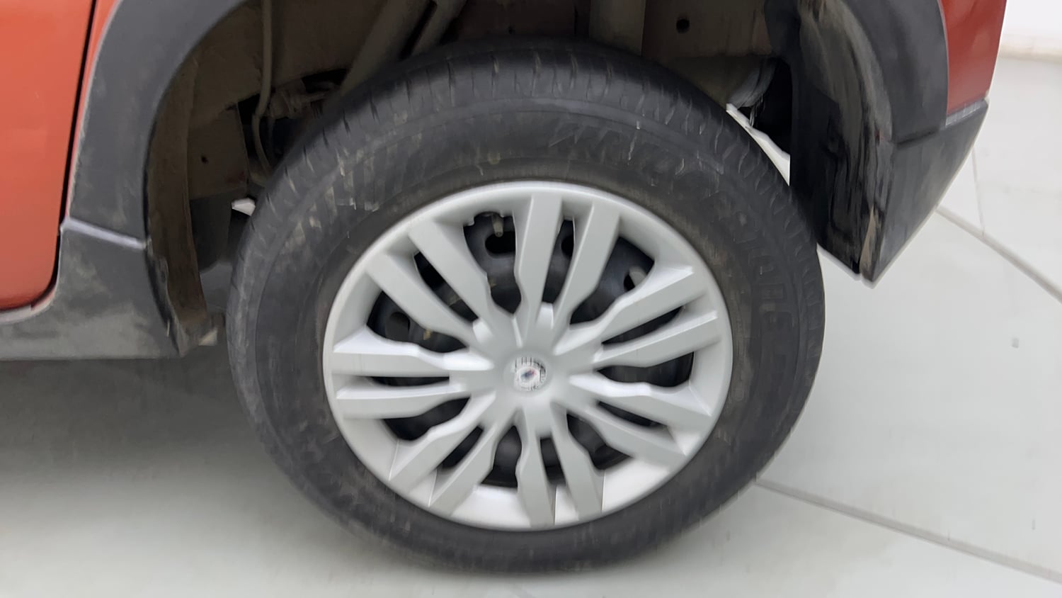 Used 2017 Mahindra KUV100 K4 6 STR Petrol Manual tyres LEFT REAR TYRE RIM VIEW