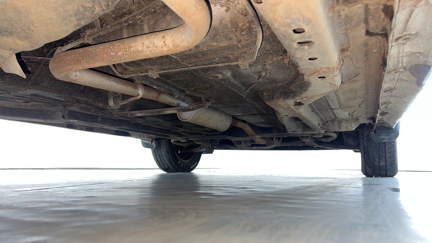 Used 2024 Tata Tigor XM Petrol Manual extra REAR RIGHT UNDERBODY VIEW