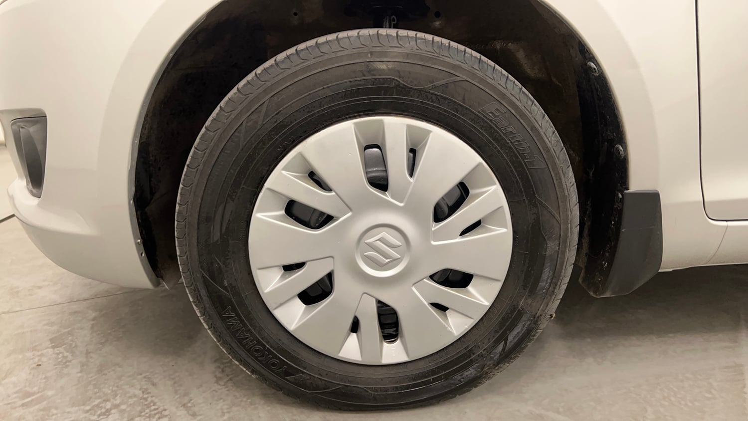 Used 2013 Maruti Suzuki Swift VXi Petrol Manual tyres LEFT FRONT TYRE RIM VIEW