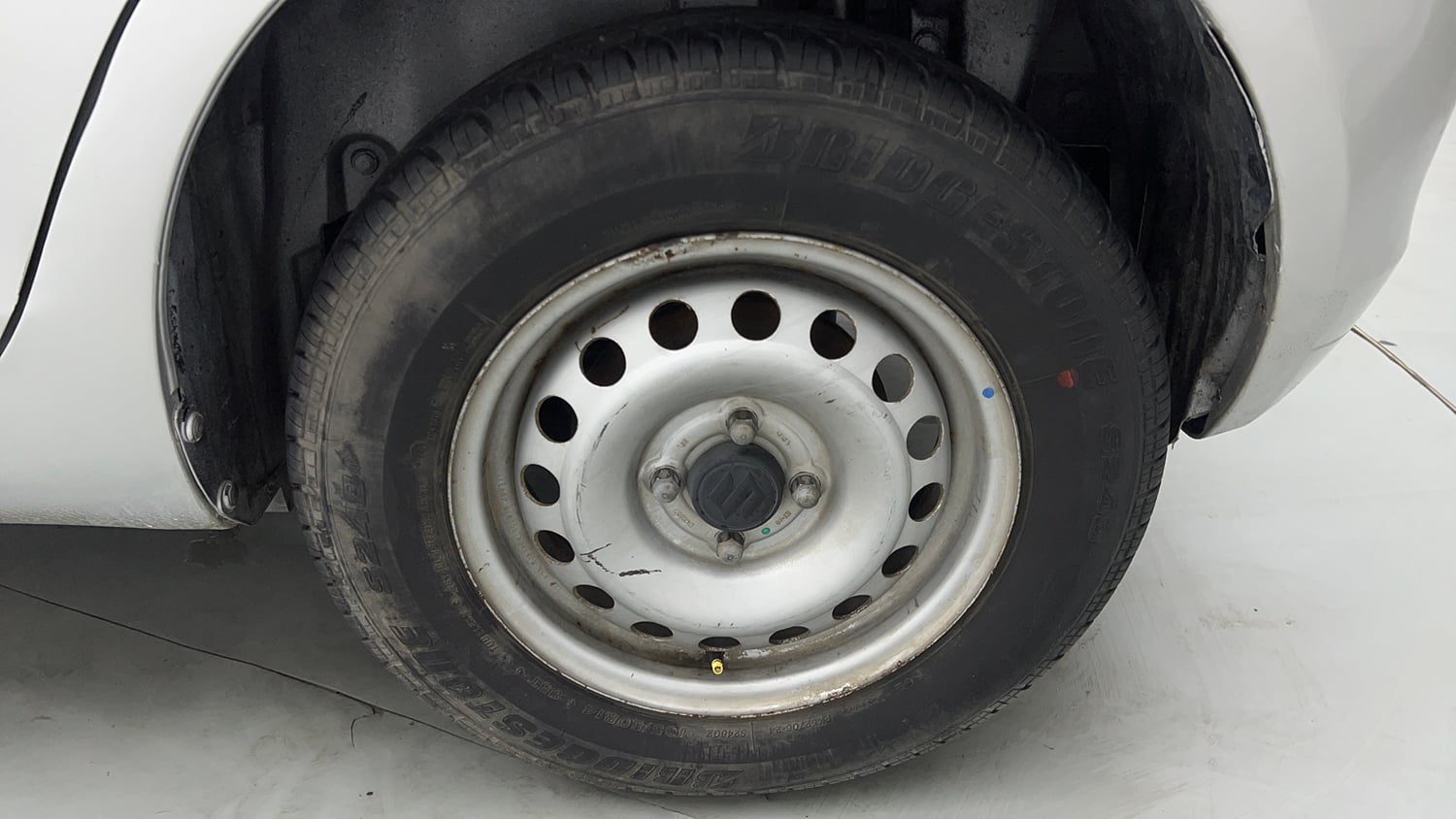 Used 2015 Maruti Suzuki Swift Lxi (O) Petrol Manual tyres LEFT REAR TYRE RIM VIEW