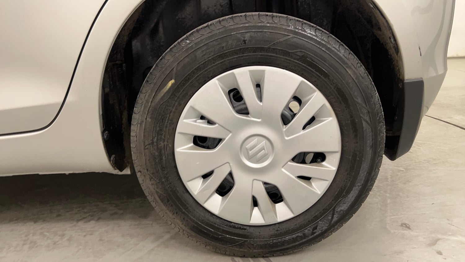 Used 2013 Maruti Suzuki Swift VXi Petrol Manual tyres LEFT REAR TYRE RIM VIEW