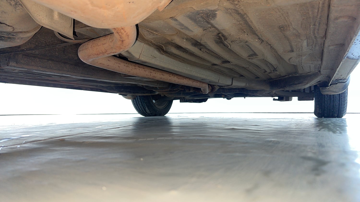 Used 2022 Honda Amaze VX CVT 1.2 Petrol Petrol Automatic extra REAR RIGHT UNDERBODY VIEW