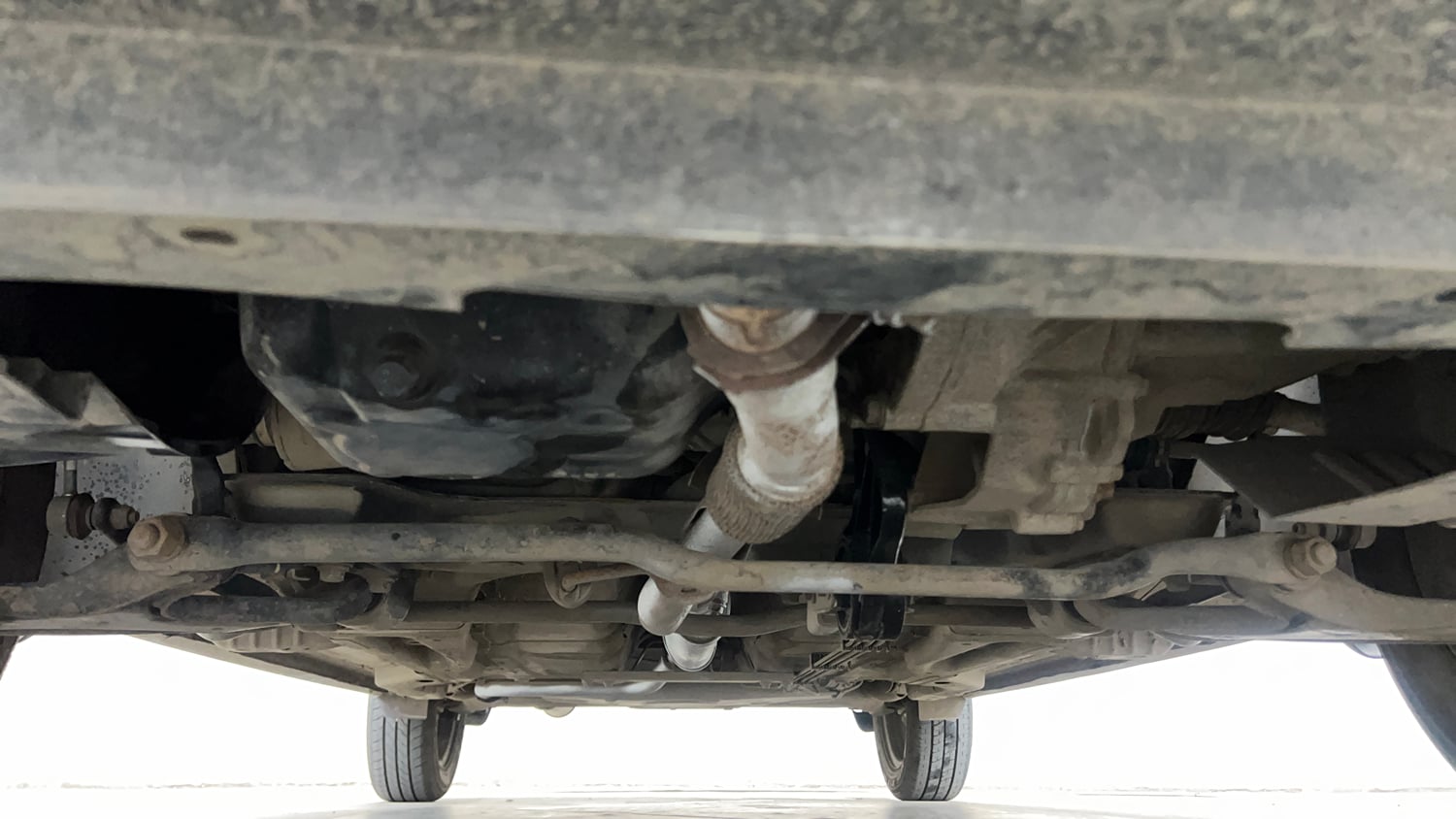 Used 2017 Tata Tiago Revotron XT Petrol Manual extra FRONT LEFT UNDERBODY VIEW