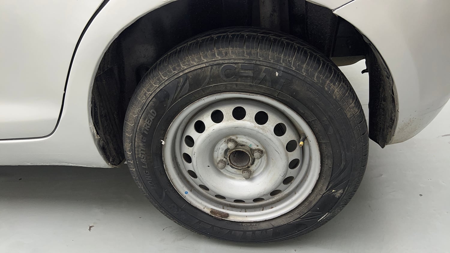 Used 2017 Maruti Suzuki Swift Lxi (O) Petrol Manual tyres LEFT REAR TYRE RIM VIEW