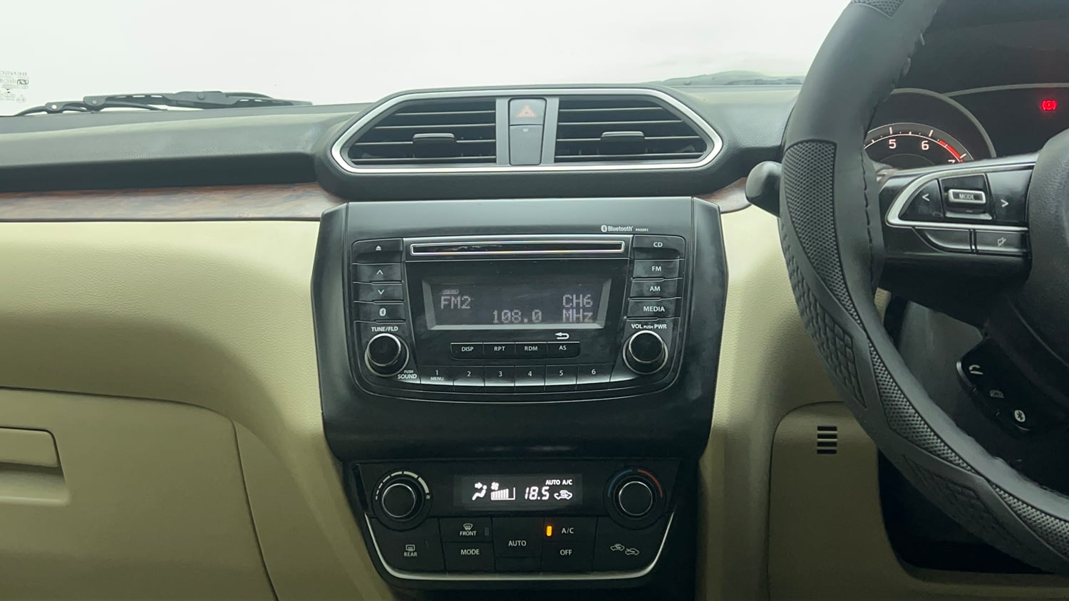 Used 2017 Maruti Suzuki Dzire ZXi AMT Petrol Automatic top_features Integrated (in-dash) music system