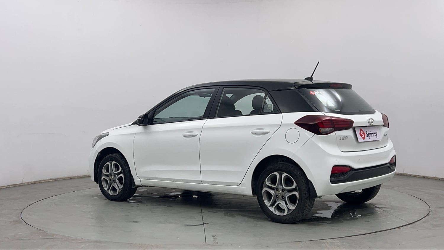 Used 2019 Hyundai Elite i20 Sportz Plus 1.2 Dual Tone Petrol Manual exterior LEFT REAR CORNER VIEW