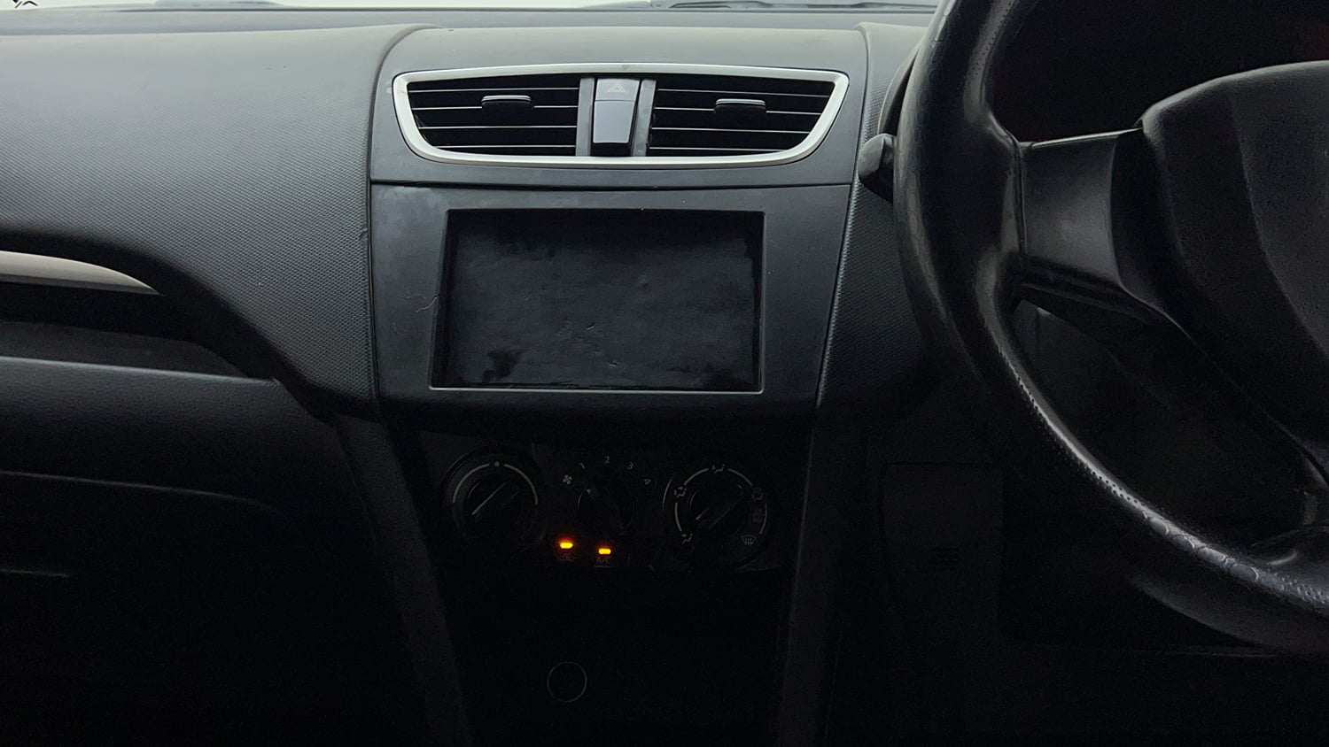 Used 2017 Maruti Suzuki Swift Lxi (O) Petrol Manual interior MUSIC SYSTEM & AC CONTROL VIEW