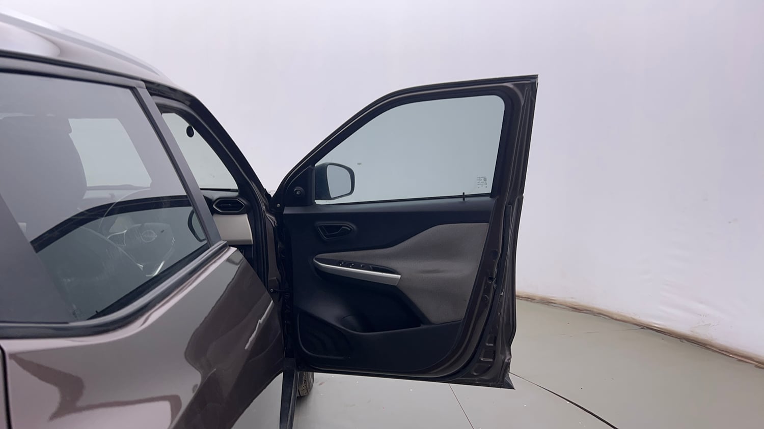 Used 2023 Nissan Magnite XE Petrol Manual interior RIGHT FRONT DOOR OPEN VIEW
