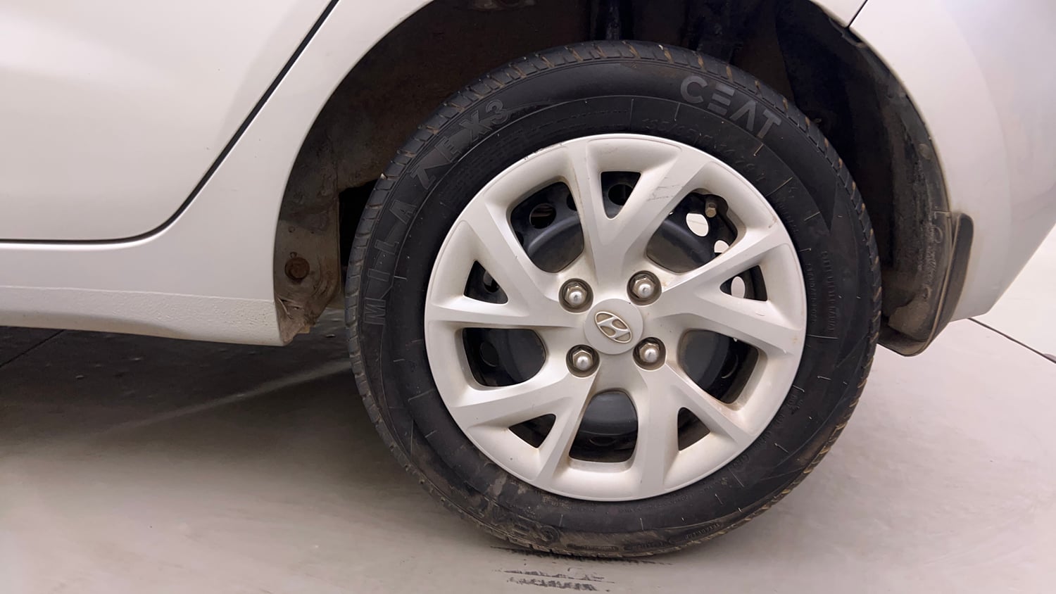 Used 2018 Hyundai Grand i10 Magna 1.2 Kappa VTVT Petrol Manual tyres LEFT REAR TYRE RIM VIEW