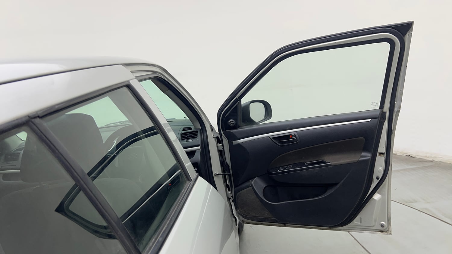Used 2017 Maruti Suzuki Swift Lxi (O) Petrol Manual interior RIGHT FRONT DOOR OPEN VIEW